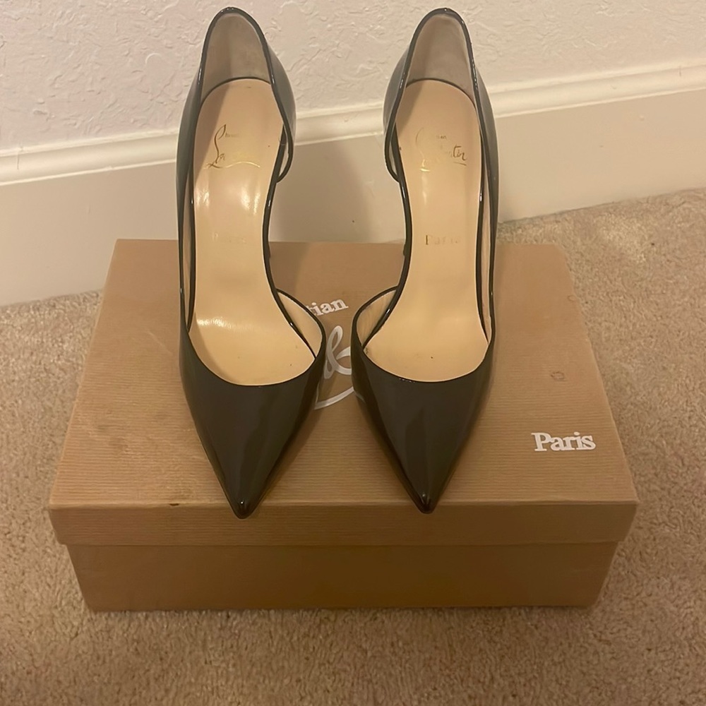 Size 37.5 ;iriza 100 patent black; box and red bag included